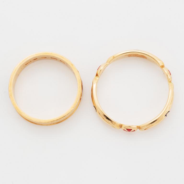 Two rings, 18K gold and enamel.