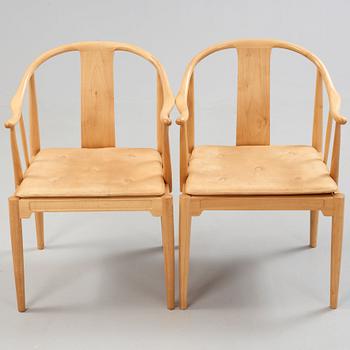 A pair of Hans J Wegner 'China chairs', Fritz Hansen, Denmark 1986-87.