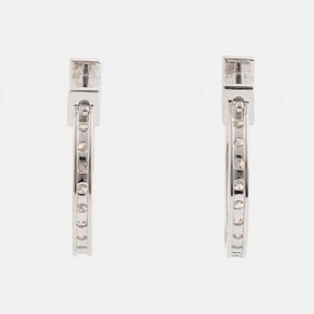 Brilliant cut diamond hoop earrings.