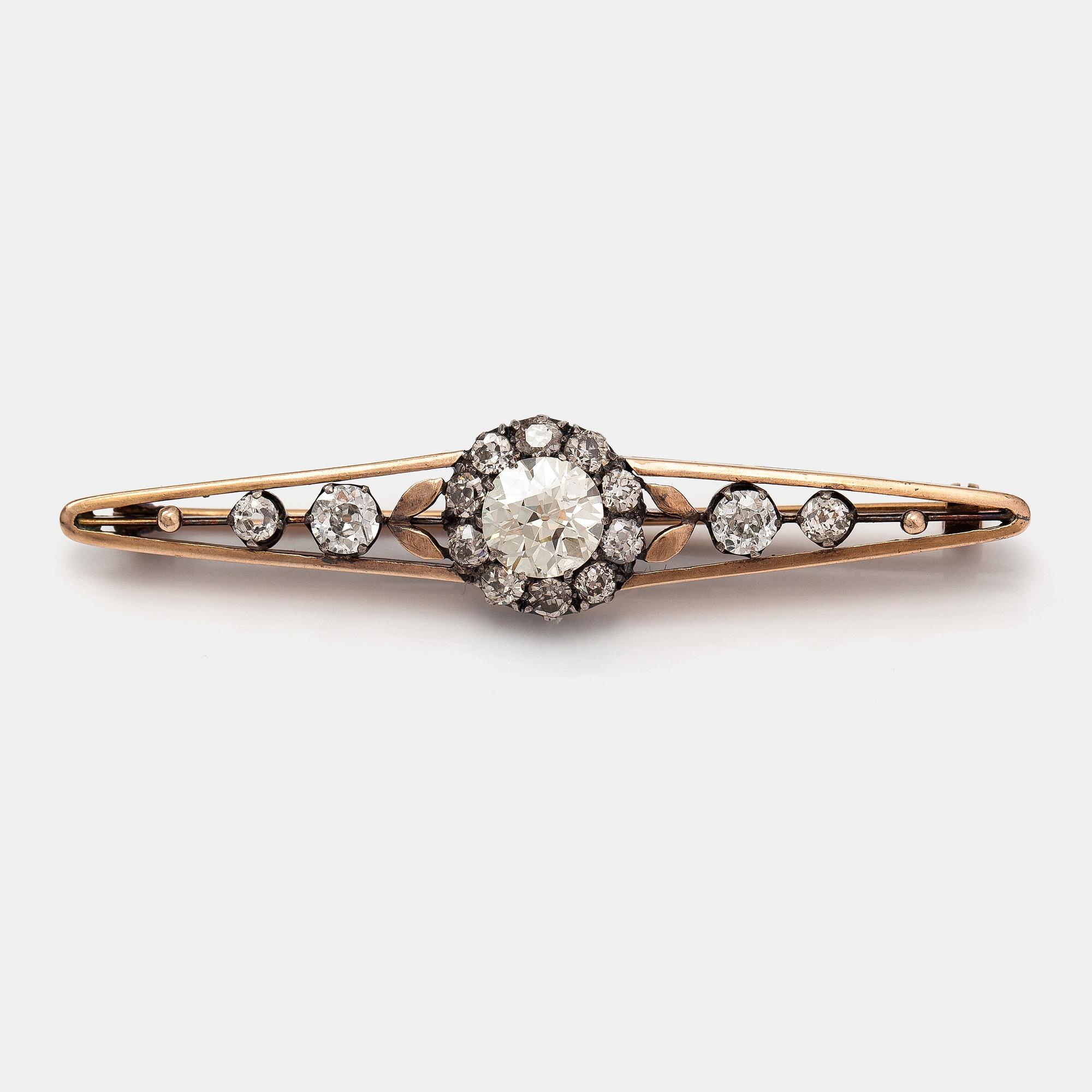 A 14K gold and silver brooch with old cut diamonds ca. 3.30 ct in total. Turn of the 20th century.