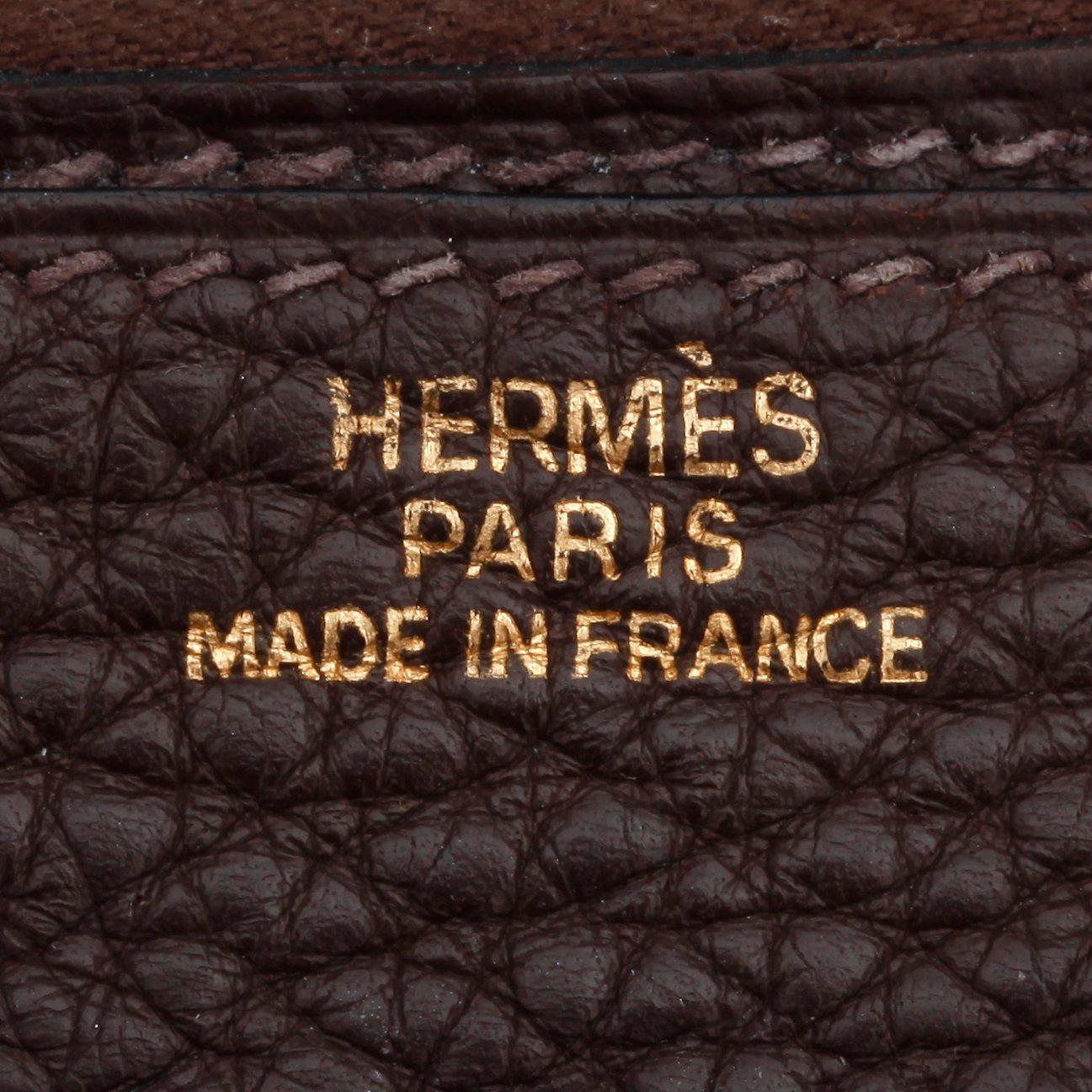 HERMÈS, a brown leather wallet, "Dogon".