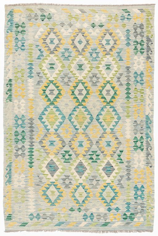 A Kilim rug, c. 245 x 162 cm.