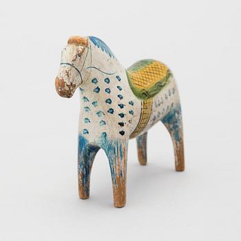 A painted folk art dala horse first half of the 20th century.