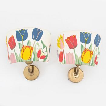 Josef Frank, a pair of model '2143' brass wall lamps, Firma Svenskt Tenn.