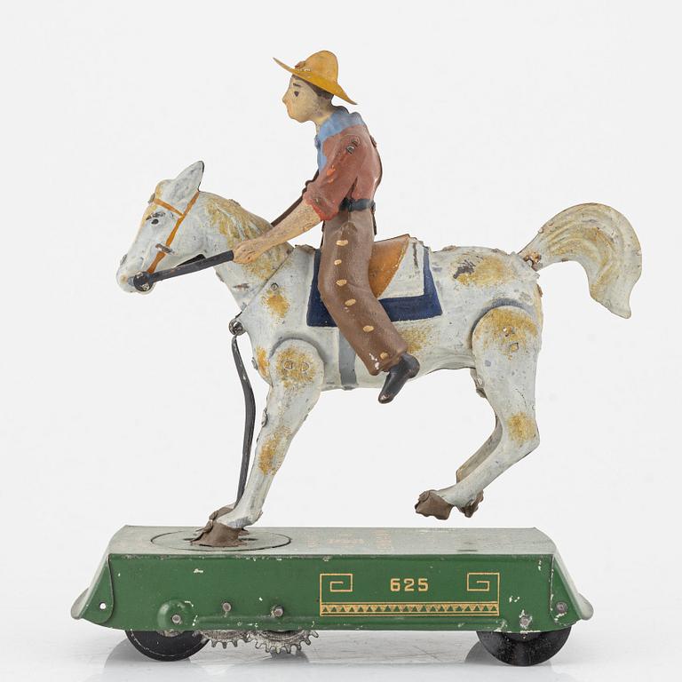 Lehmann, A tinplate 'Bucking Broncho 625' Germany. In production from 1903.