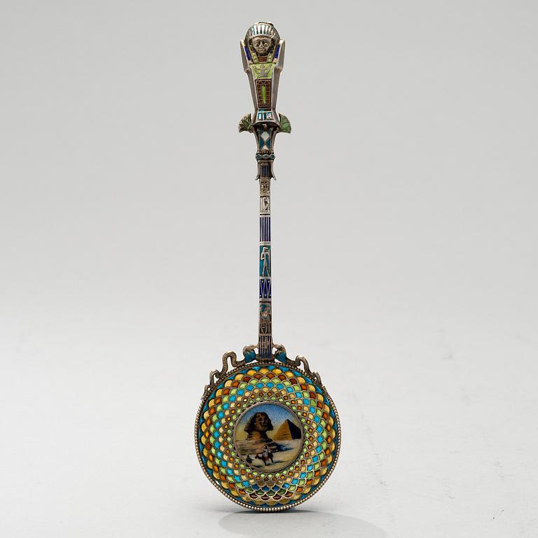 A SPOON, silver and enamel, egyptique revival, 1920s.