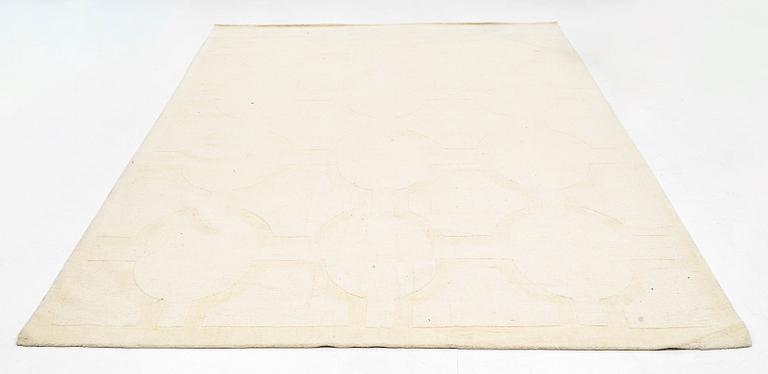 A hantd tufted carpet, 'Entrance - bone white' by Layered, ca 400 x 300 cm.