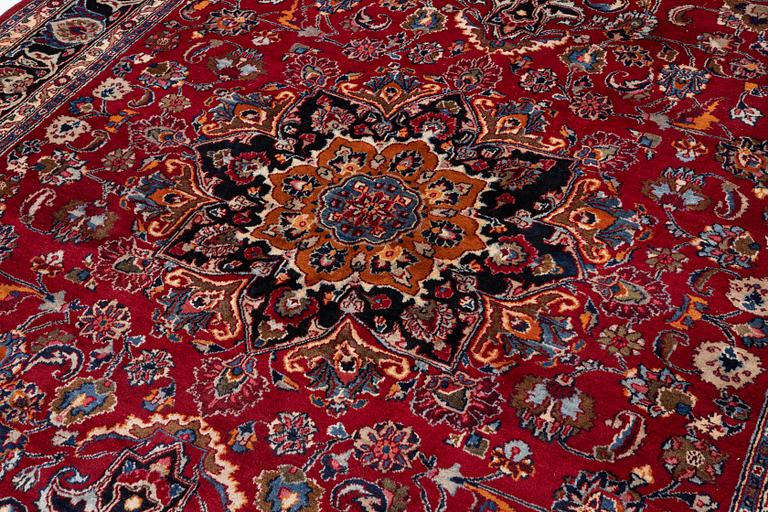 A carpet, Oriental, c. 335 x 257 cm.