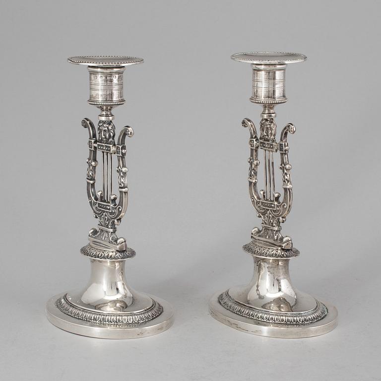 A pair of Swedish empire silver candlesticks by Adolf Zethelius, Stockholm 1826.