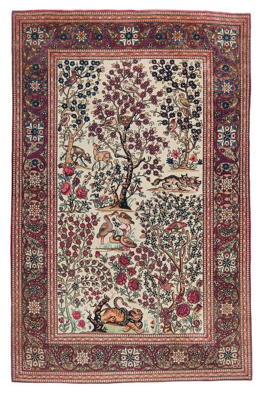 A CARPET, a semi-antique Esfahan figural, 215,5 x 140,5 cm.