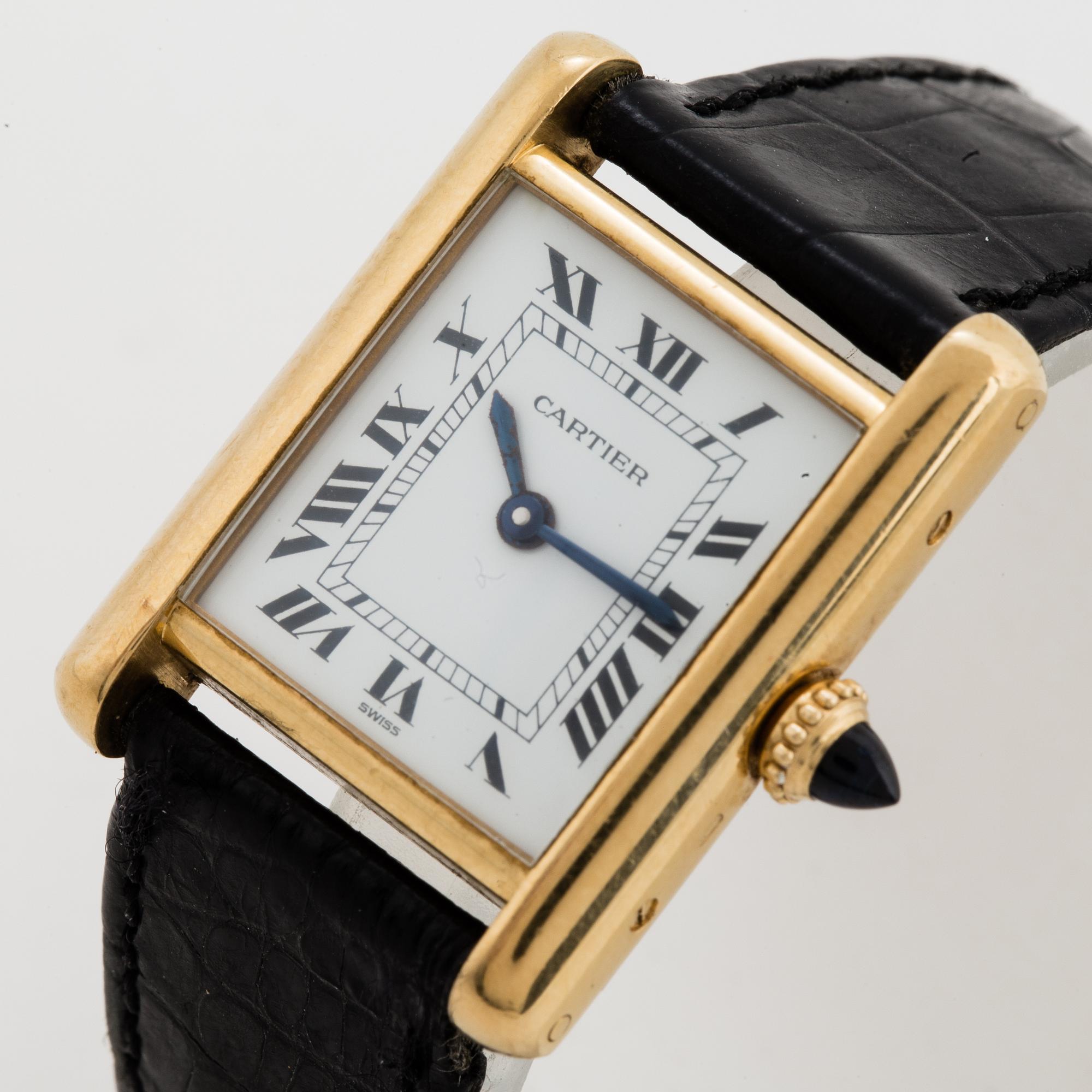 Cartier, Tank, wristwatch, 20,5, x 20 (28) mm.