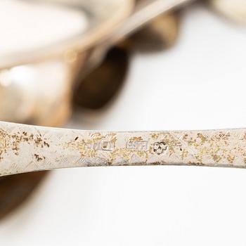 Sixteen silver spoons and seven teaspoons, Sweden, 19th and 20th century.