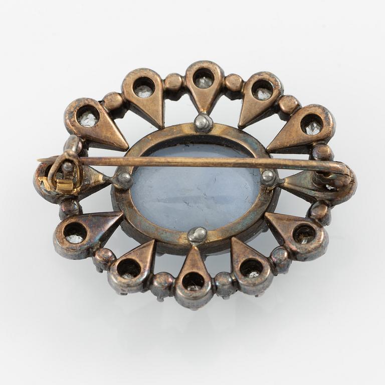 Brooch, silver with moonstone and old-cut as well as rose-cut diamonds.