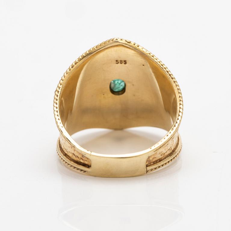 14K gold ring with an emerald.
