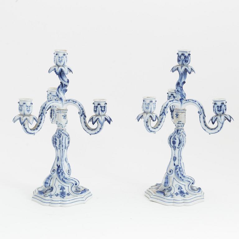 A pair of rococo style porcelain candelabras, Meissen, Germany, early 20th century.