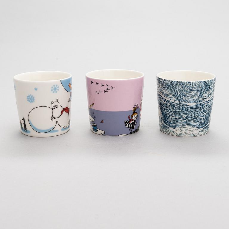 A set of seven winter theme Moomin mugs, vitro porcelain, Moomin Characters, Arabia.