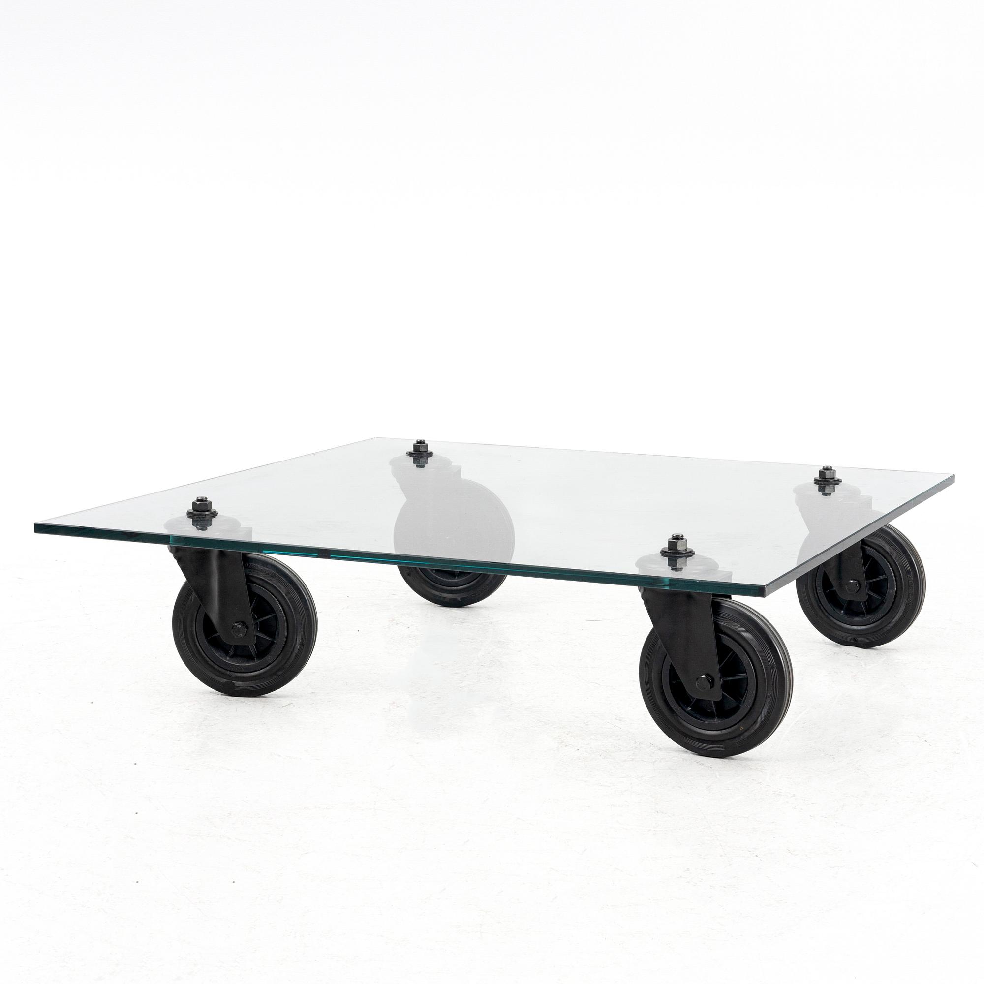 Gae Aulenti, Coffee table, “Tavolo con Ruote”, Fontana Arte, Italy, late 20th/early 21st century.
