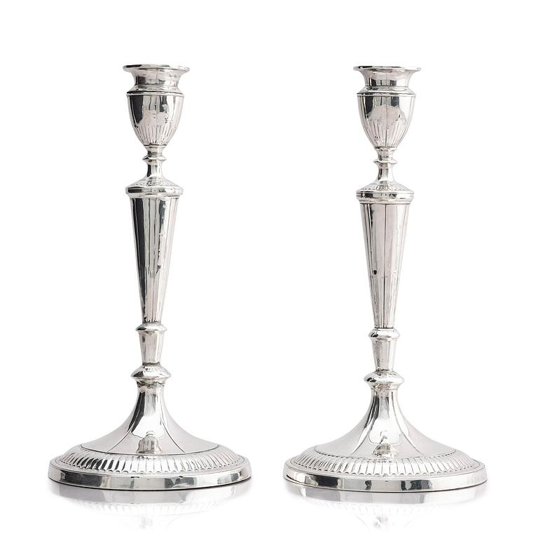 A pair of 18th century silver candlesticks, marks of John Parson & Co, Sheffield 1791.