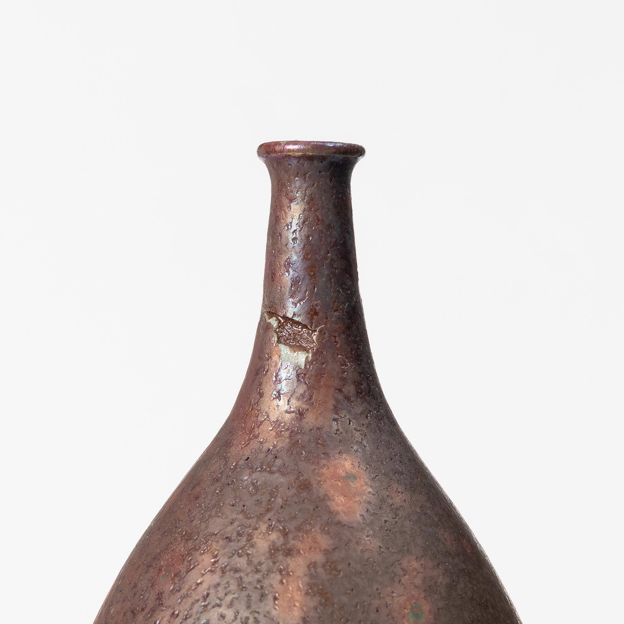 Joan Carrillo, two sculptures/vases.