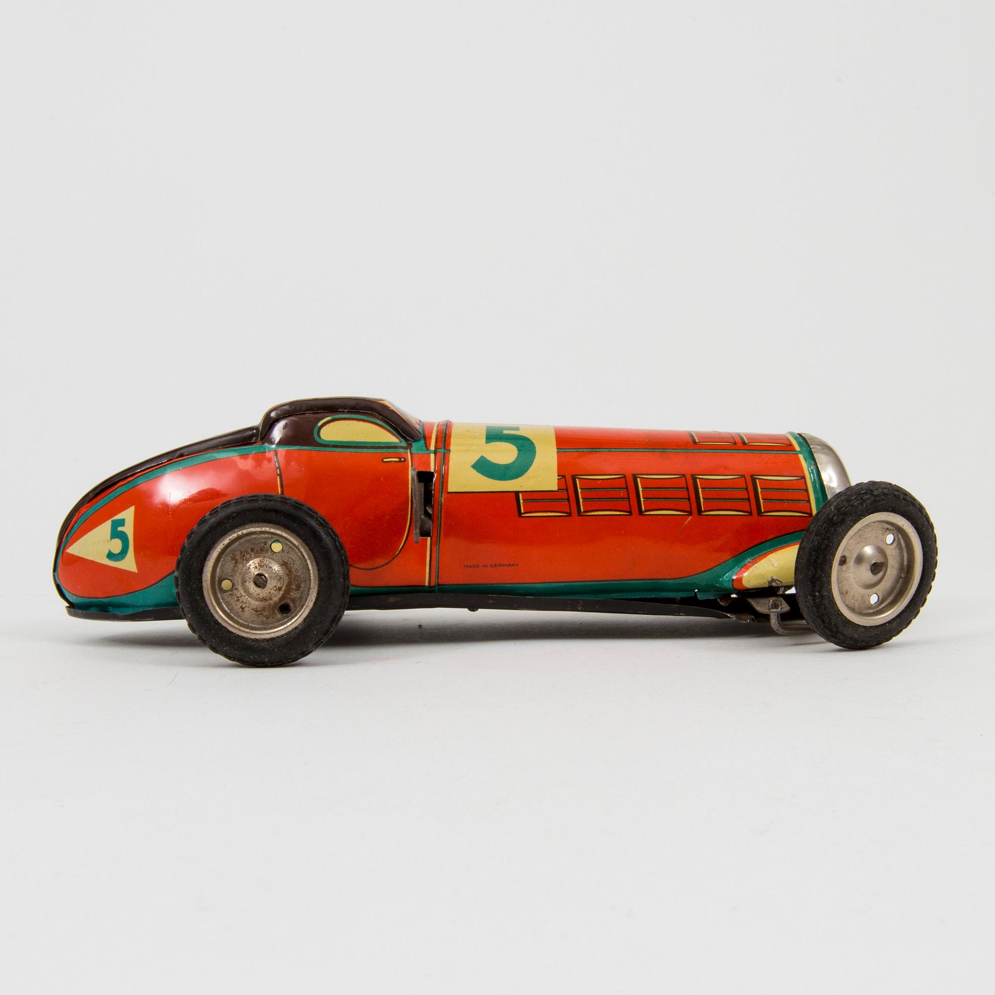 A JNF tinplate racing car 1930/40s.