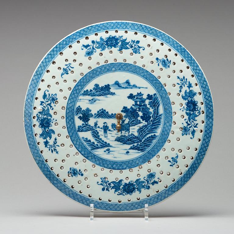 A large blue and white dish with strainer, Qing dynasty, Qianlong (1736-95).