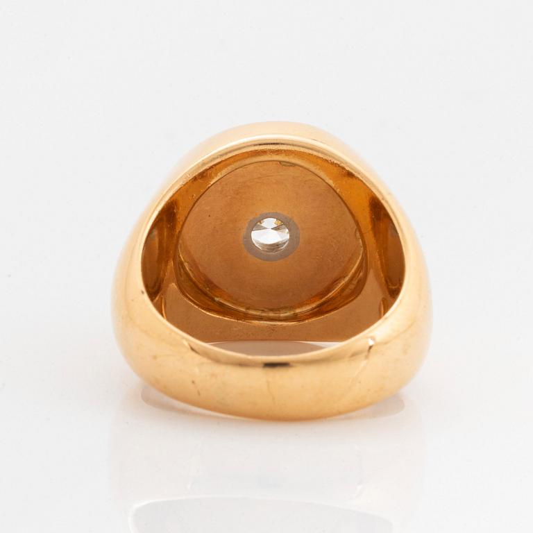 A WA Bolin ring in 18K gold set with a round brilliant-cut diamond.