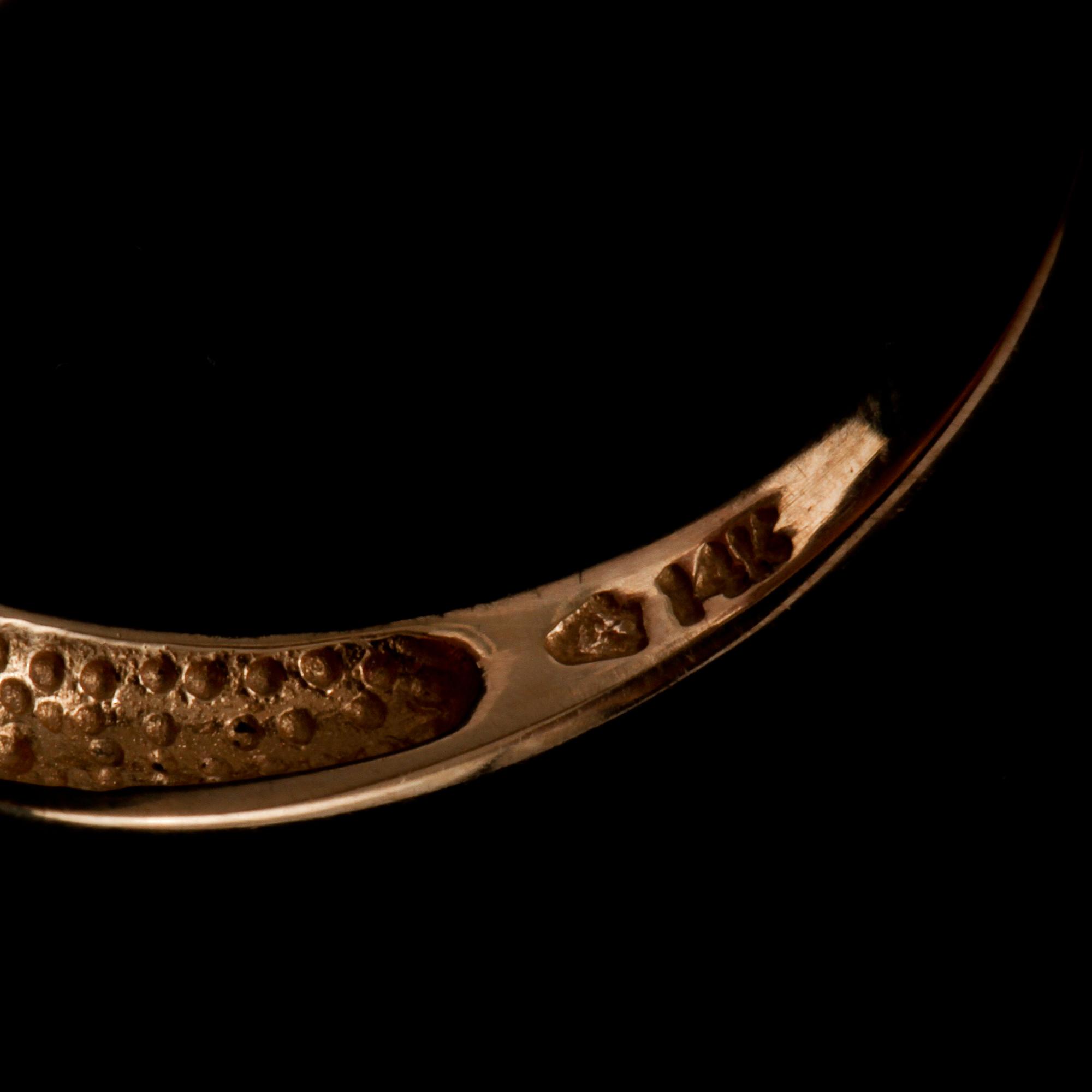RING, 14k guld med 12 fasettslipade olikfärgade safirer samt 23 briljantslipade diamanter. Vikt 4 g.