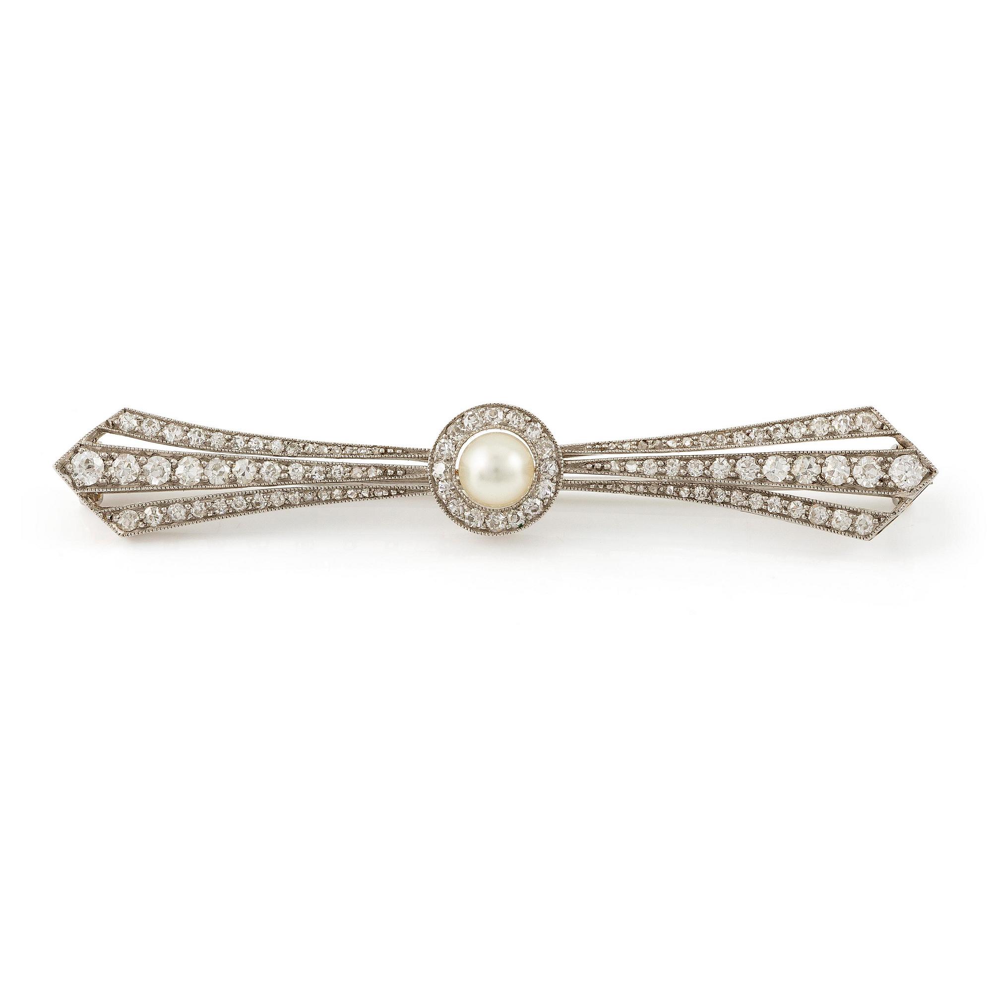 A brooch with a pearl and old-cut diamonds.