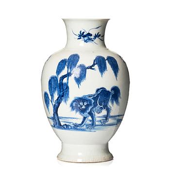 A blue and white bronze shaped vase with mythical creatures, Qing dynasty, 19th Century.