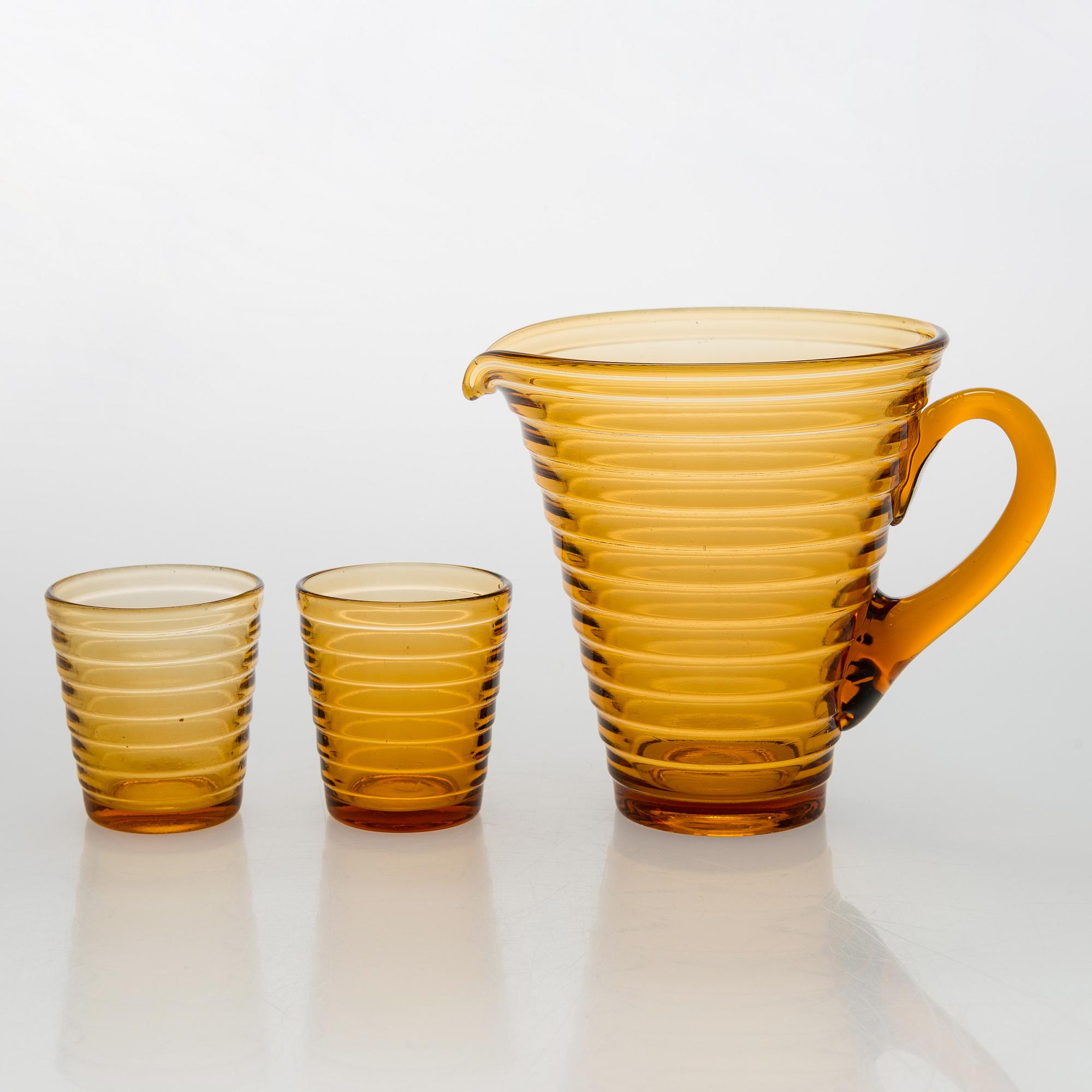 Aino Aalto, A 1930s pitcher model 4644 and two drinking glasses model 4056 for Karhula for Karhula Glassworks, Finland.