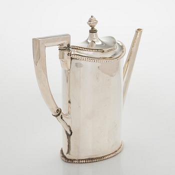An early 20th century 4- piece sterling silver empire coffee set, C.G. Hallbergs Guldsmeds AB, Stockholm.