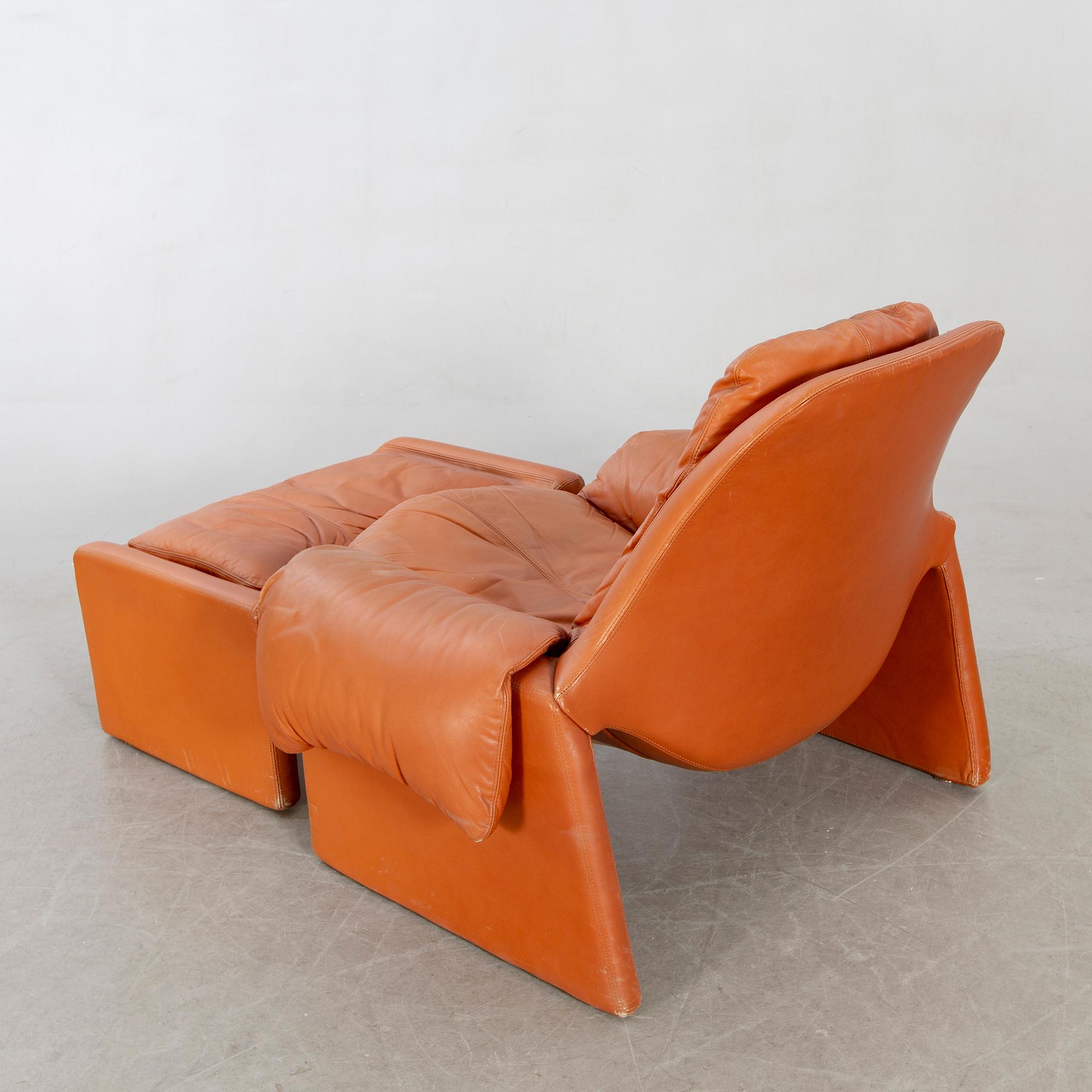 Vittorio Introini, a leather armchair and stool for Saporti 1960/70s.