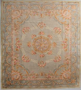 An antique Central European Savonnerie carpet, c.. 500 x 387 cm.