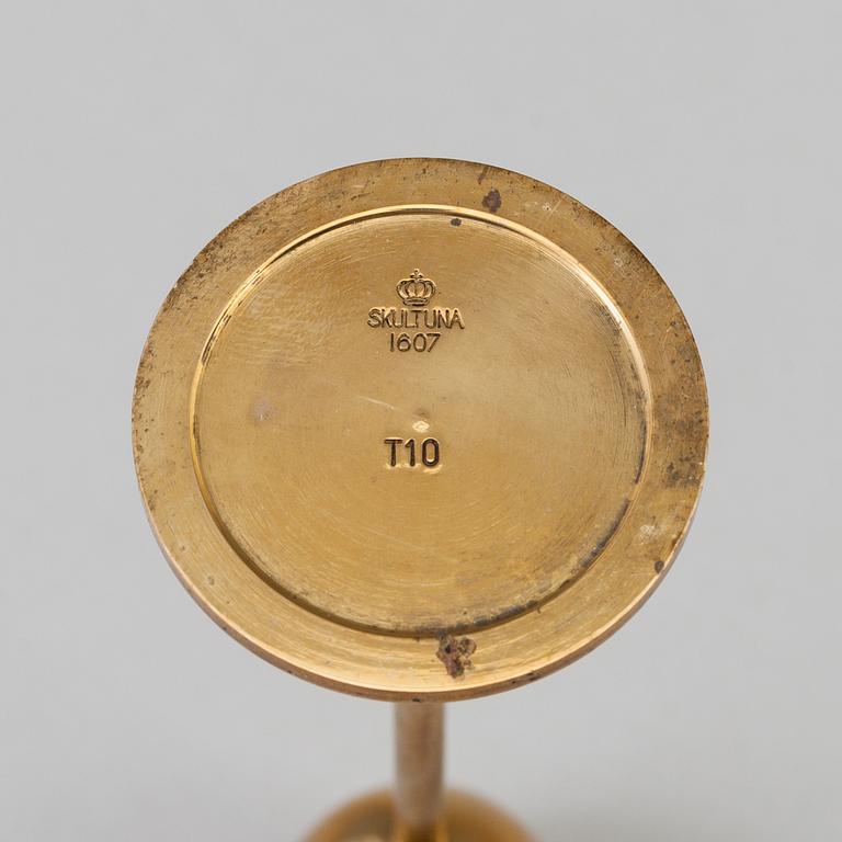 Pierre Forssell, A set of three 'Tulip' brass candlesticks by Skultuna Bruk, 1993.