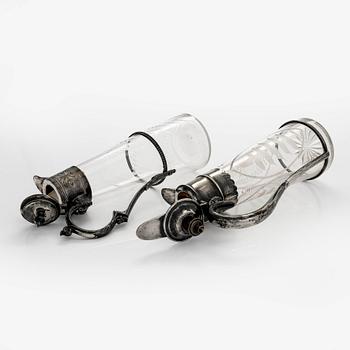 Two wine pitches, around 1900.