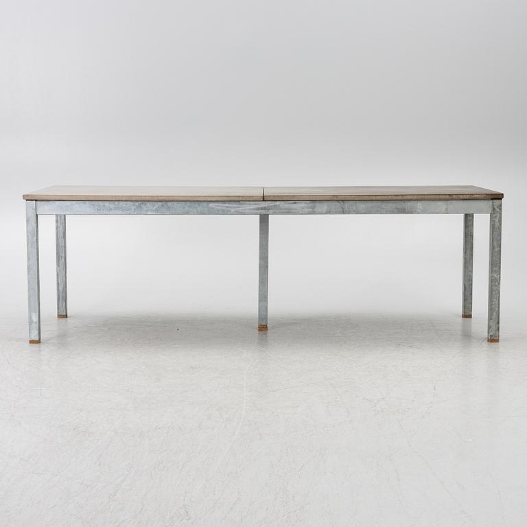 A table, probably MBJ Design.
