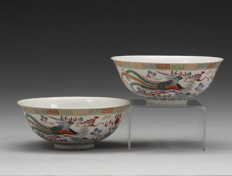 A pair of dragon and phoenix bowls, China, Republic with Qianlong mark.