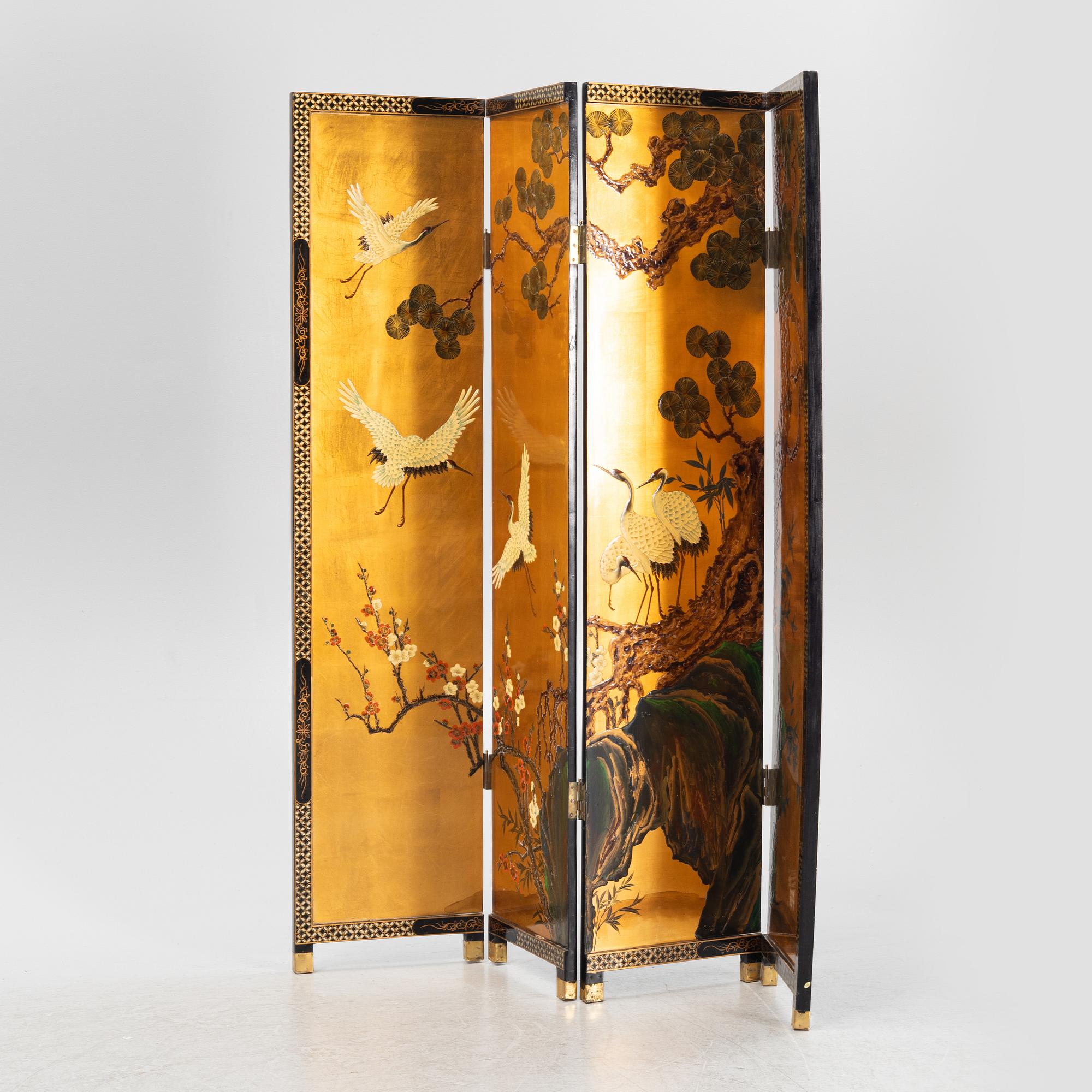 A Chinese lacquer folding screen, 20th century.