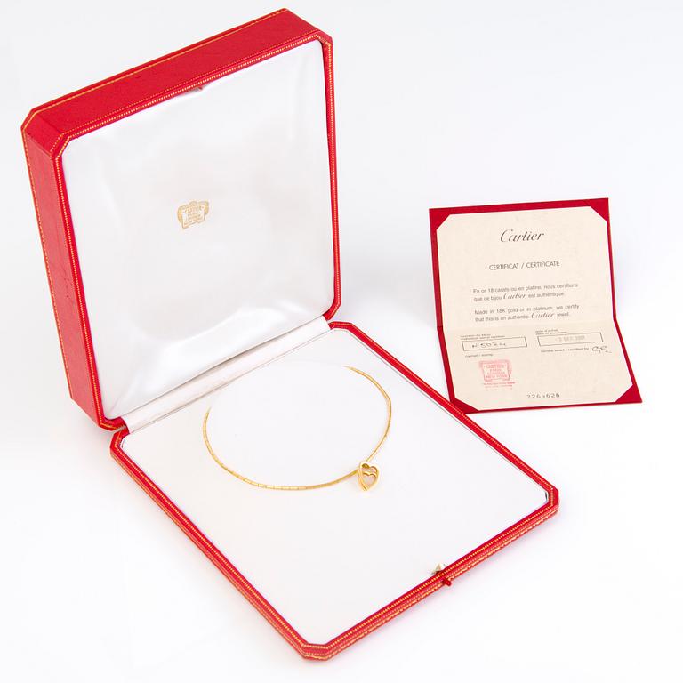 A Cartier 18K gold necklace with heart pendant 1999 and 2001. Certificat and original box.