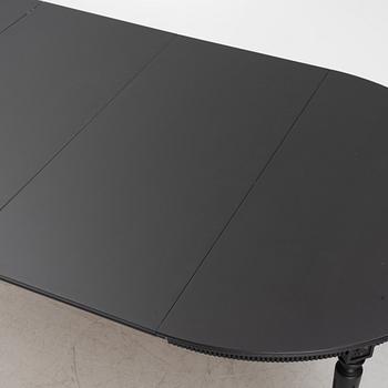 A Gustavian style dining table, mid 20th century.