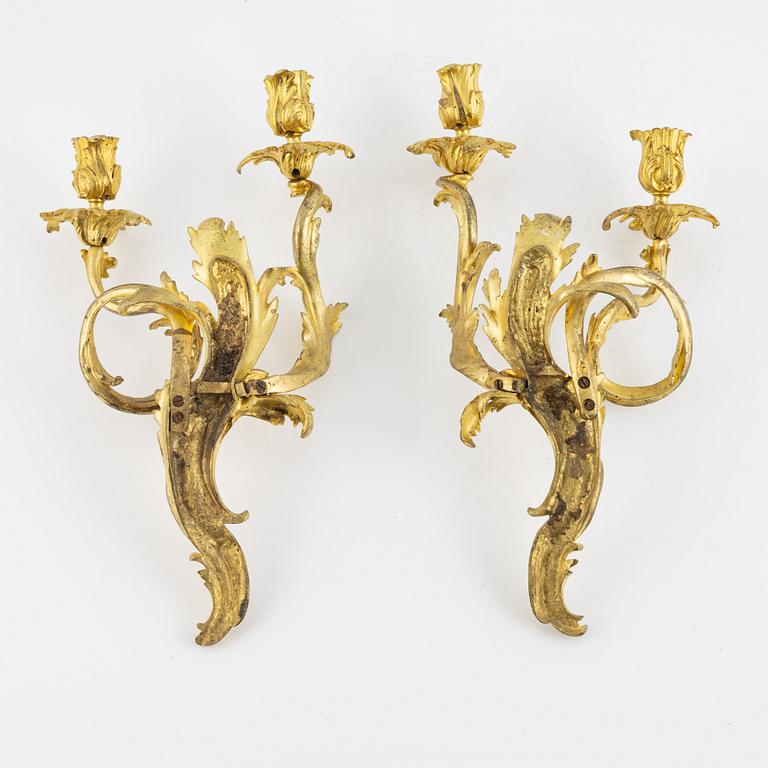 A pair of French Louis XV style two-branch appliques, 19th century.