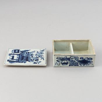 A set with two famille rose serving dishes, six odd plates, and a box with cover, Qing dynasty, 18th/19th Century.