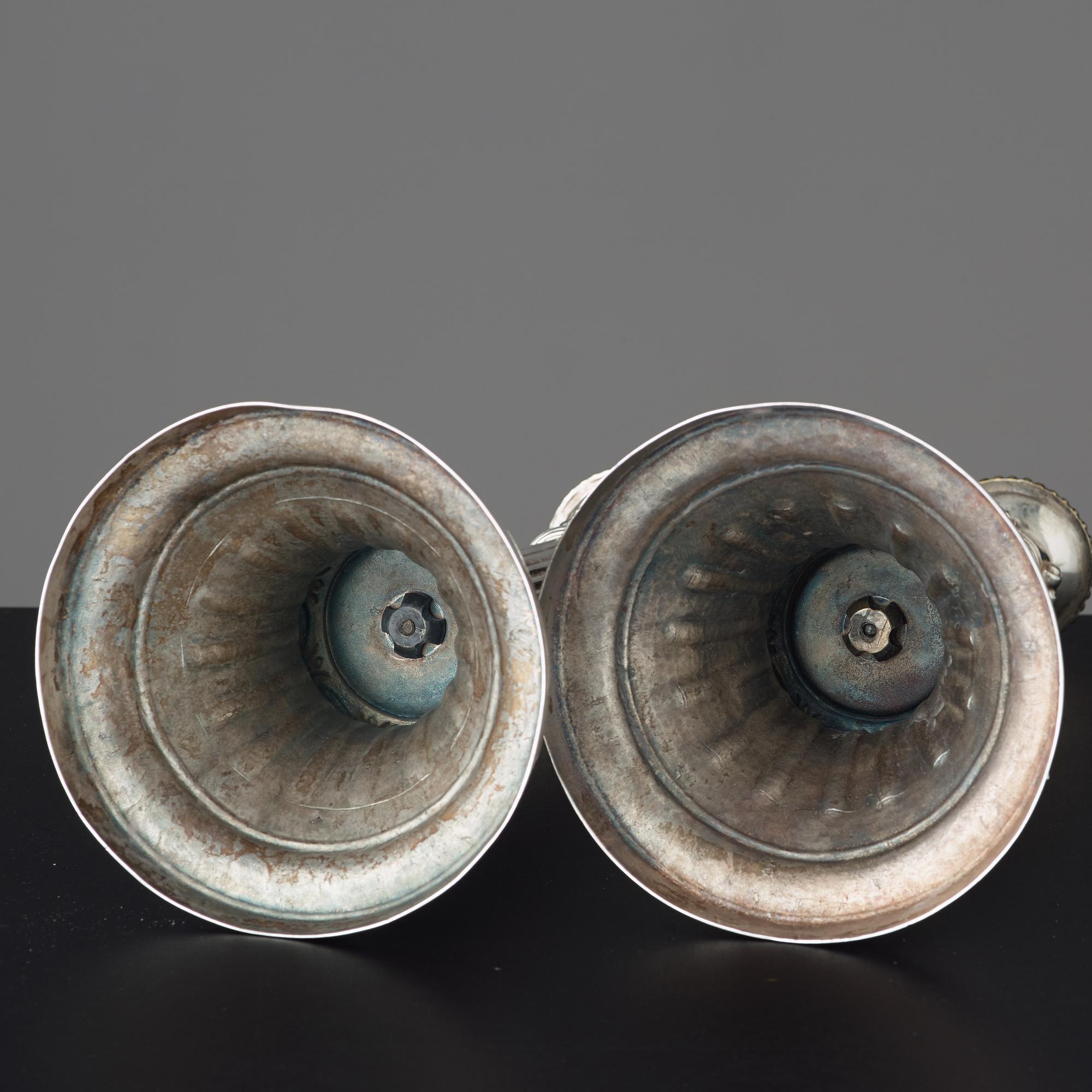 Two similar Gustavian late 18th century candlesticks.