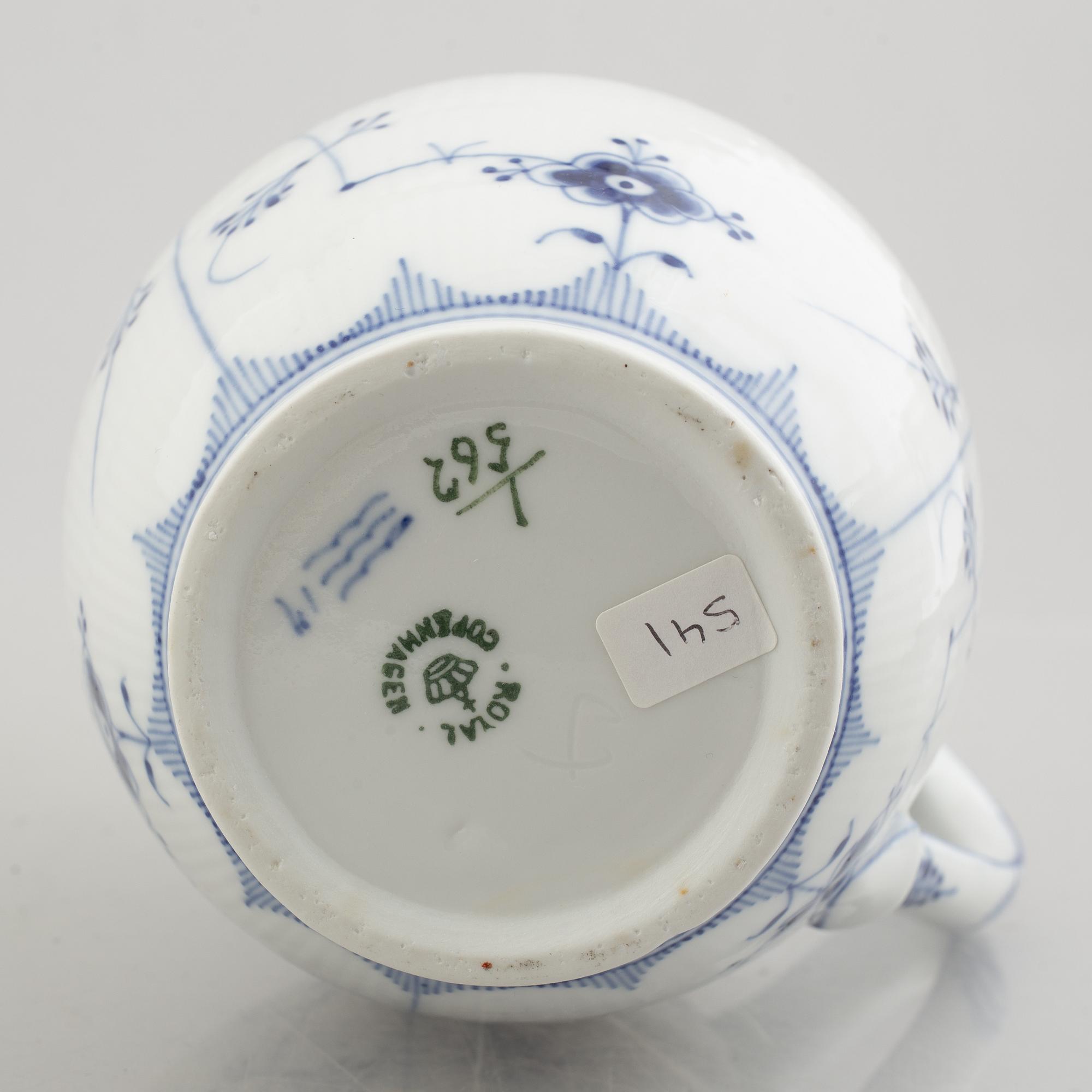 Three 'Blue Fluted Half Lace' / 'Musselmalet' porcelain jugs, Royal Copenhagen, model 562, 561, 763, 1898-1923 and 1962.