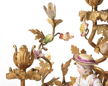 A pair of Meissen Rococo-style three-light candelabra, second half of the 1800's.