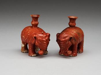 A matched pair of elephant candle holders, Qing dynasty.