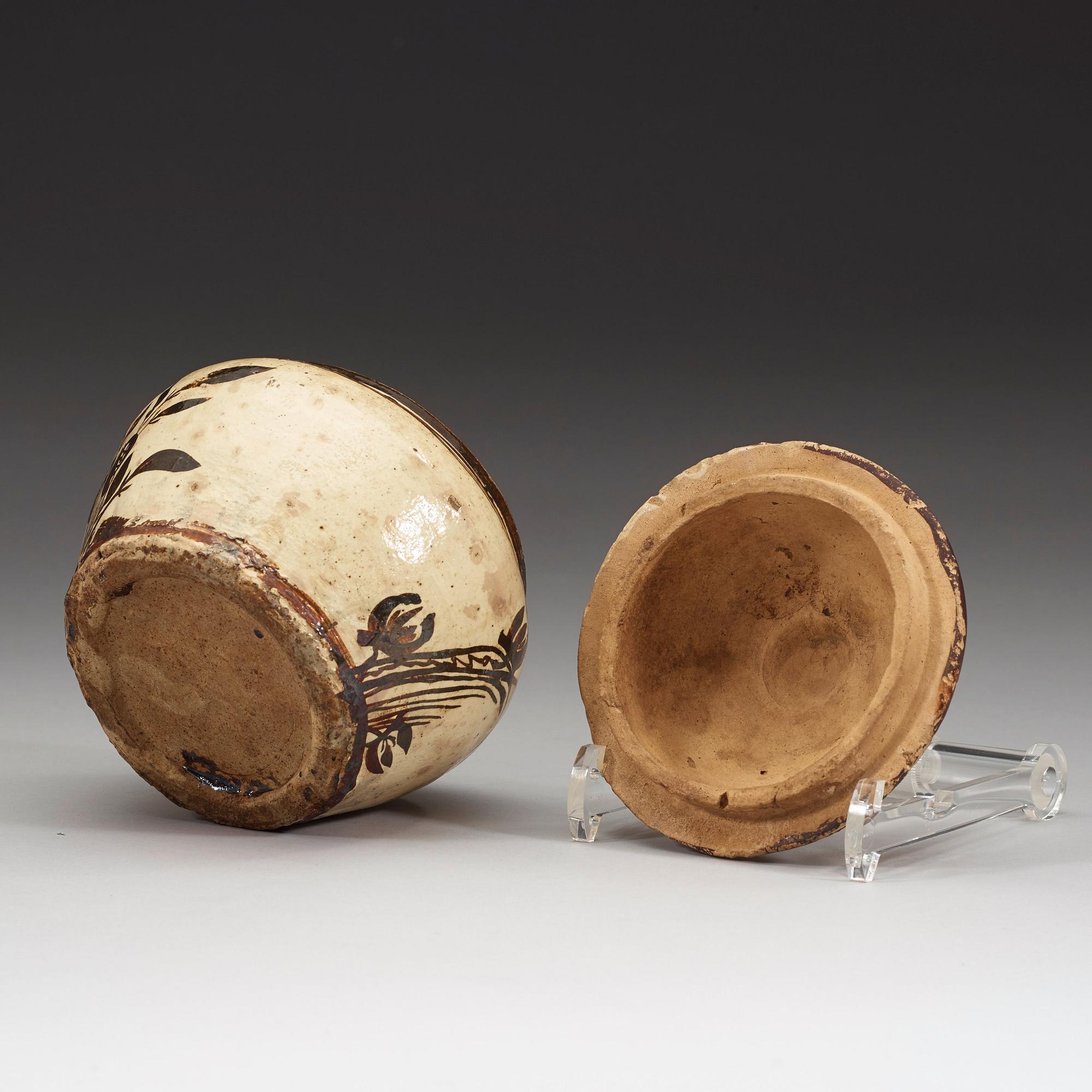 A Cizhou ware pot with cover, presumably Yuan dynasty (1260-1370).
