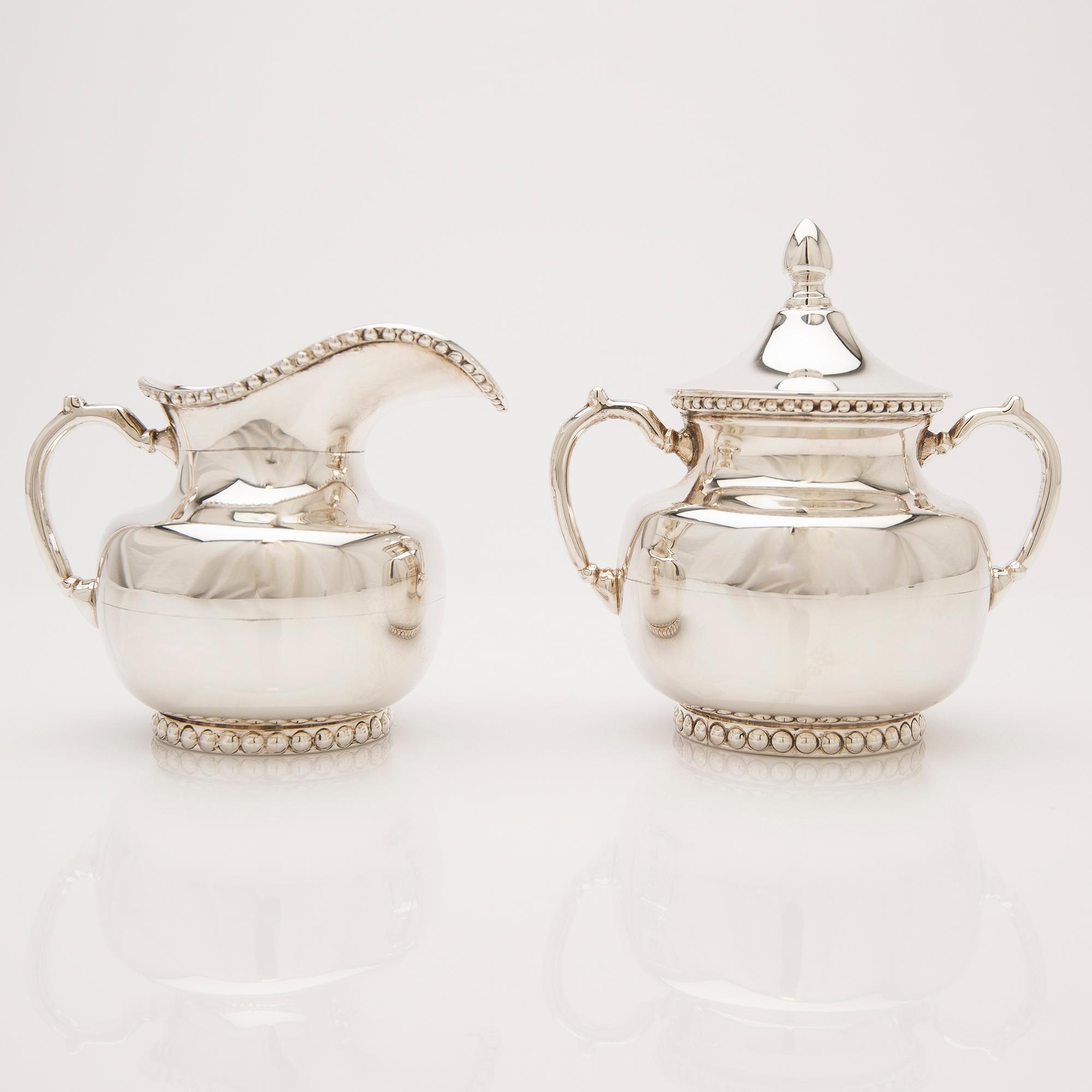Creamer and sugar bowl with lid, sterling silver, Mexico.