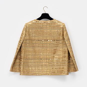 Chanel, a gold bouclé jacket, size 34.