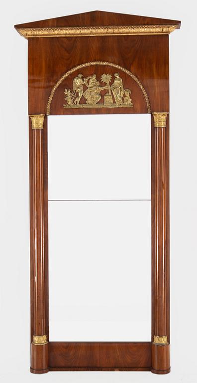 An Empire mirror and console table, first half of the 19th century.